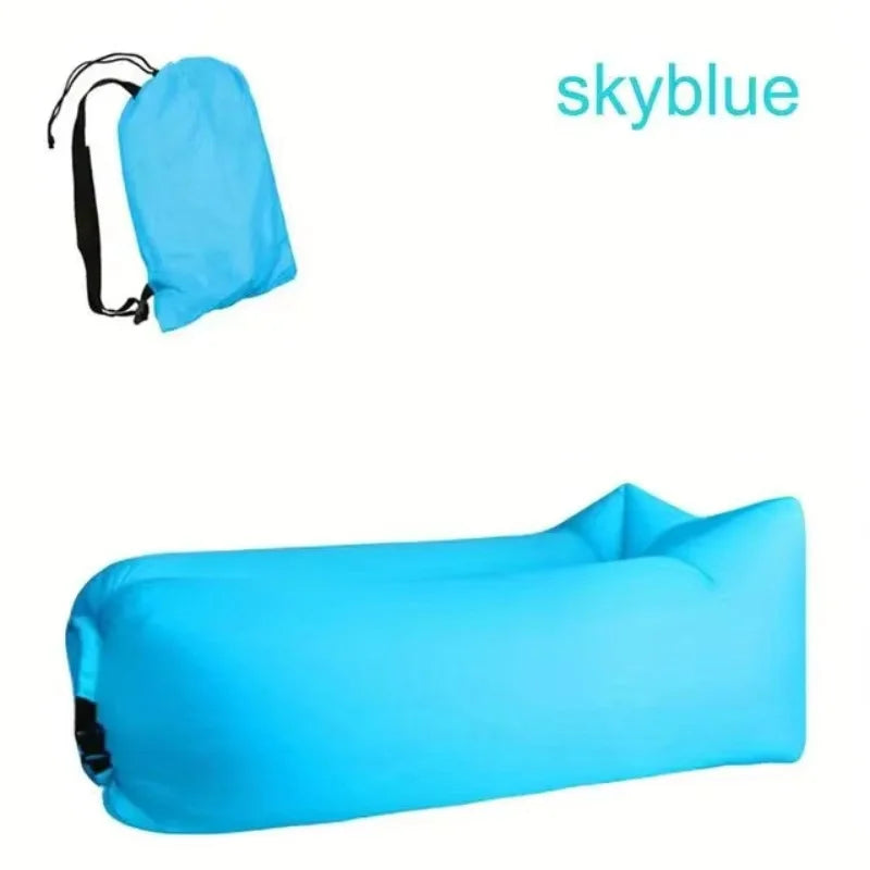Person relaxing on inflatable air lounger