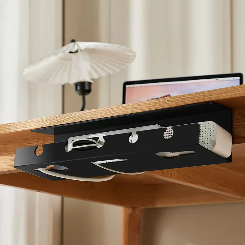 Clamp-on wire organizer holding power strip