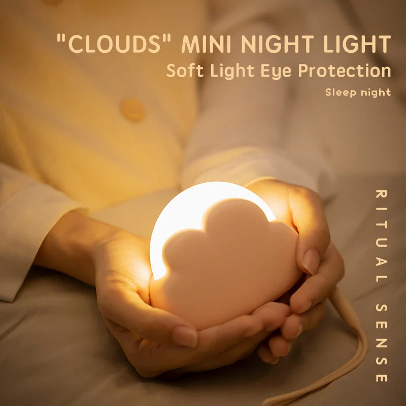 Cloud night light glowing in bedroom