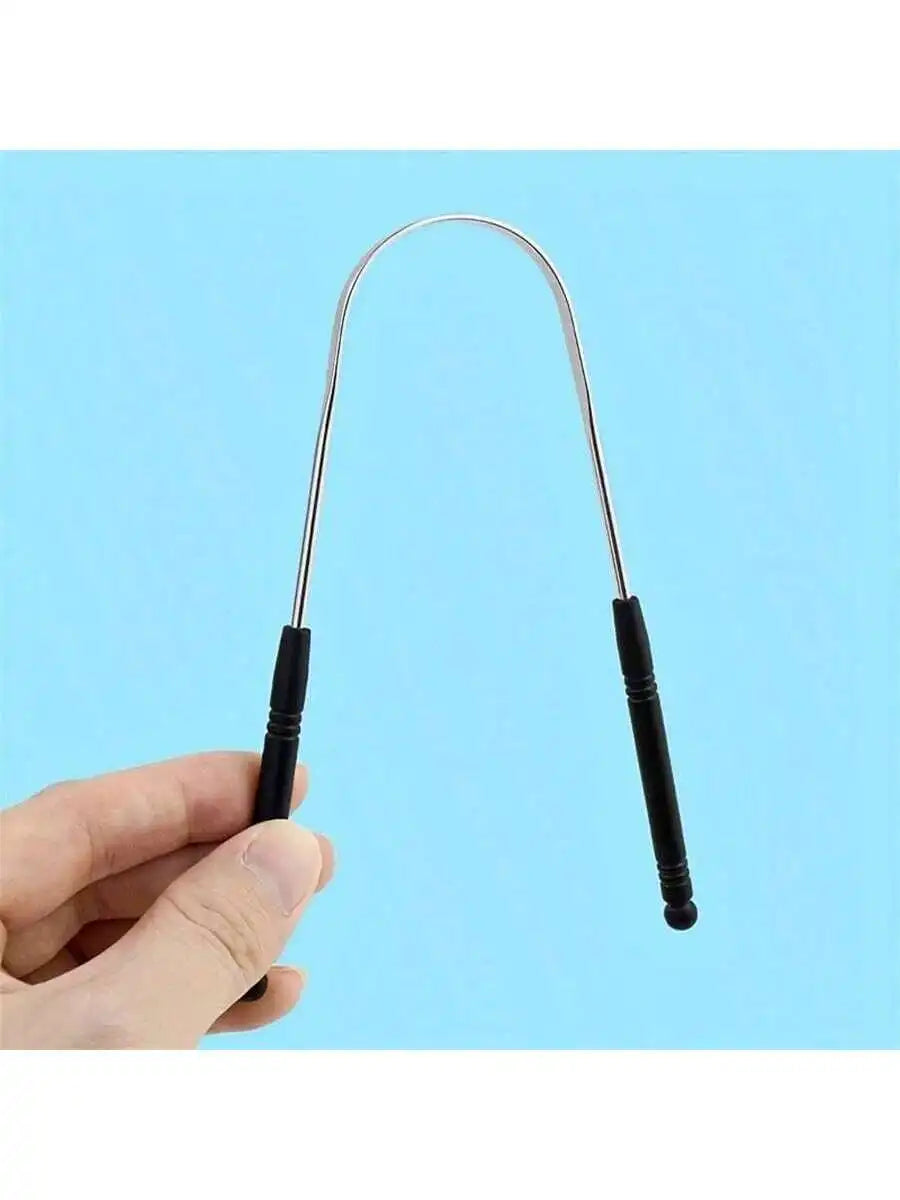 Person using stainless steel tongue cleaner